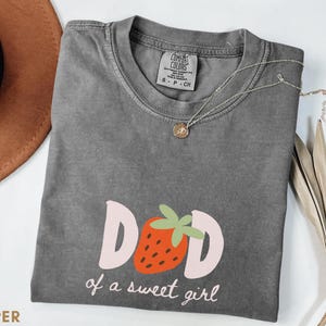 Dada strawberry shirt mockup for berry sweet one first birthday celebration, matching family comfort colors tee for strawberry themed birthday party