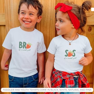 Kids wearing berry sweet one matching family shirts for strawberry themed first birthday party, adorable mommy and me strawberry birthday outfit inspiration