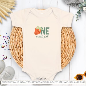 Flat lay mockup of strawberry birthday mom shirt with berry sweet one design for first birthday party, mommy and me matching family shirts, comfort colors strawberry mama tee