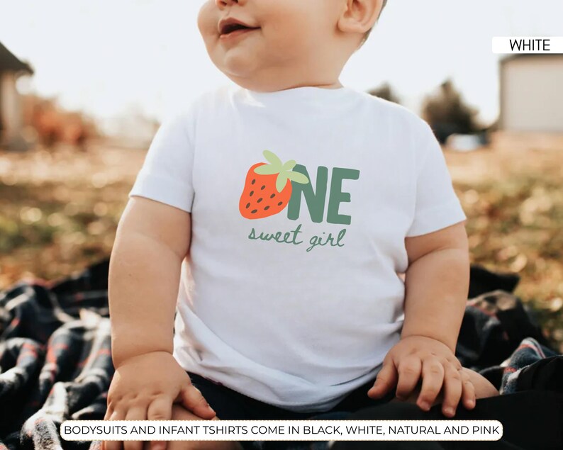 Toddler wearing berry sweet one first birthday shirt with strawberry design, cute comfort colors strawberry birthday party tee for family matching outfits