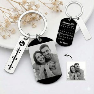 May include: A set of three ceramic mugs with a speckled, matte finish. Each mug features a different color: light blue, cream, and gray. The mugs have a simple, modern design with a rounded shape and a comfortable handle.