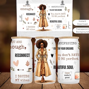 May include: White tumbler with a bamboo lid featuring an illustration of a woman in a tan coat and sunglasses. Text includes "You are enough," "Manifesting," and "Beautiful Soul." The design is repeated on a print.