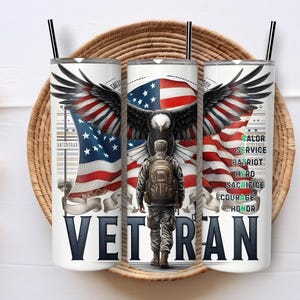 May include: A white tumbler with a black straw, featuring an American flag design with an eagle and a soldier. The word "VETERAN" is prominently displayed. Additional text includes words like "Valor" and "Service".