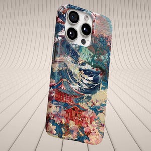 May include: A phone case featuring a colorful, artistic design. The case showcases a Japanese-inspired landscape with a red temple, blue water, and floral accents. The design is a blend of abstract and realistic elements.