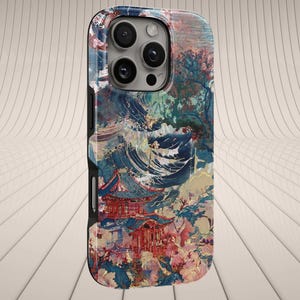 May include: A phone case featuring an artistic design with a Japanese pagoda, cherry blossoms, and a mountain landscape. The case has a multi-camera system and a black border. The color palette includes shades of red, blue, and pink.