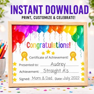 May include: A wooden-framed certificate of achievement featuring a colourful balloon border, the text "Congratulations!", "Certificate of Achievement!", "Presented to: Audrey", "Achievement: Straight A's", "Signed: Mom & Dad", and "Date: July 2022".