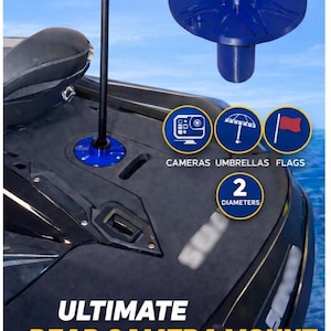 May include: A blue rear camera mount for boats, with a black pole and base. The mount is designed to hold cameras, umbrellas, and flags. The image includes the text "ULTIMATE REAR CAMERA MOUNT".