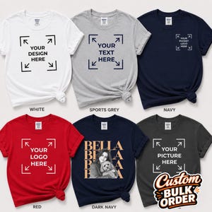 May include: Six short-sleeved crew neck t-shirts in white, sports grey, navy, red, dark navy, and charcoal grey. The shirts feature various custom print designs including text placeholders, a photo of a person with a dog, and a custom bulk order graphic.