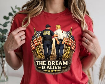 The Dream Is Alive Shirt, Political Satire Graphic Tee, Secret Service Humor Apparel