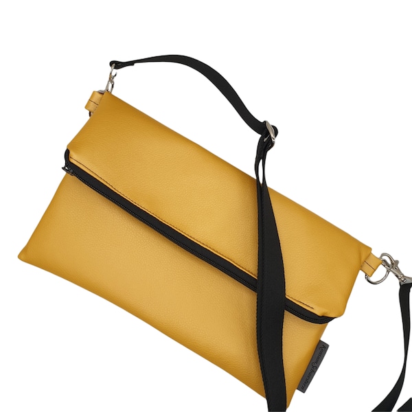 Fold-over Clutch Tasche uni oder mit Muster zu tragen in Gelb mit Leoprint
