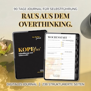 Könnte beinhalten: Ein digitales Journal mit dem Text "90 TAGE JOURNAL FÜR SELBSTFÜHRUNG" und "RAUS AUS DEM OVERTHINKING." Das Journal ist schwarz mit goldfarbenen Buchstaben und hat 238 strukturierte Seiten. Ein weißer Becher und eine Blume sind ebenfalls im Bild.