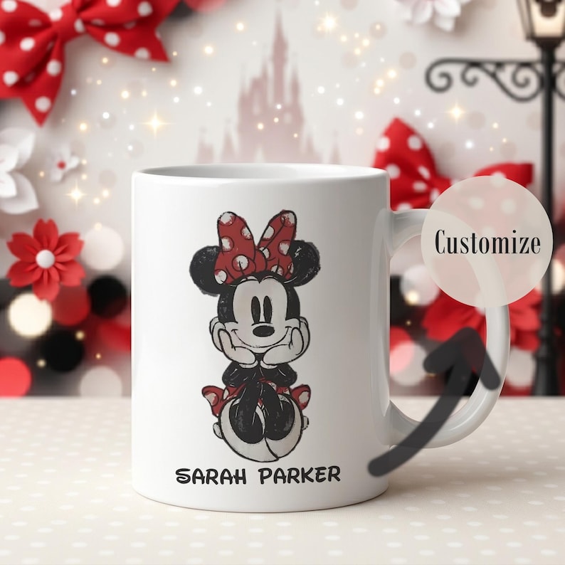 May include: White ceramic mug featuring a Minnie Mouse illustration with a red bow and polka dots. The mug has the name "SARAH PARKER" printed at the bottom. The word "Customize" is also visible.
