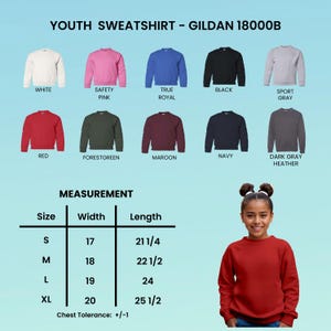 May include: A youth sweatshirt in various colors, including white, pink, blue, black, and gray. The image displays a size chart with measurements in inches and a young person wearing a red sweatshirt. The text reads "YOUTH SWEATSHIRT - GILDAN 18000B."