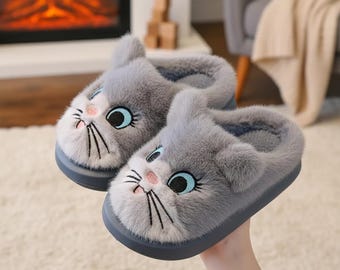 Pantufas de gatinho fofinhas para crianças, pantufas de coelhinho de pelúcia para bebês, mules de inverno quentinhas e antiderrapantes para bebês, sapatos de gatinho com sola macia para bebês e crianças pequenas.