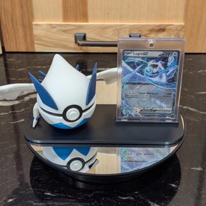 Lugia EX Prismatic Evolutions Display Bundle: Card, Slider Case, Stand & Lugia Pokéball