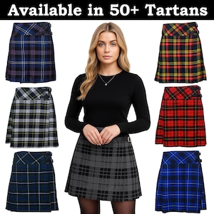 May include: A woman wearing a black long-sleeve top and a gray plaid skirt, surrounded by various plaid skirts in different colors. The text "Available in 50+ Tartans" is at the top of the image. The skirts feature a button closure.