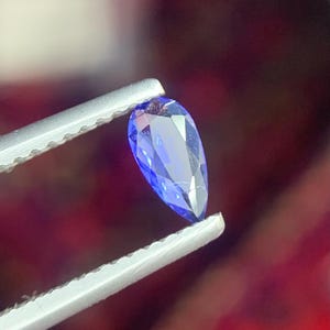 0.16/Ct,Exceptional Rare Purple-Blue Hackmanite Gemstone, Pear Shape,Fluroscence,Highly Reactive,Afghanistan Origin.