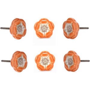 May include: Six orange flower-shaped cabinet knobs with a white centre. The knobs have a textured, petal-like design and a metal screw for attachment. These decorative knobs are ideal for adding a floral accent to furniture.