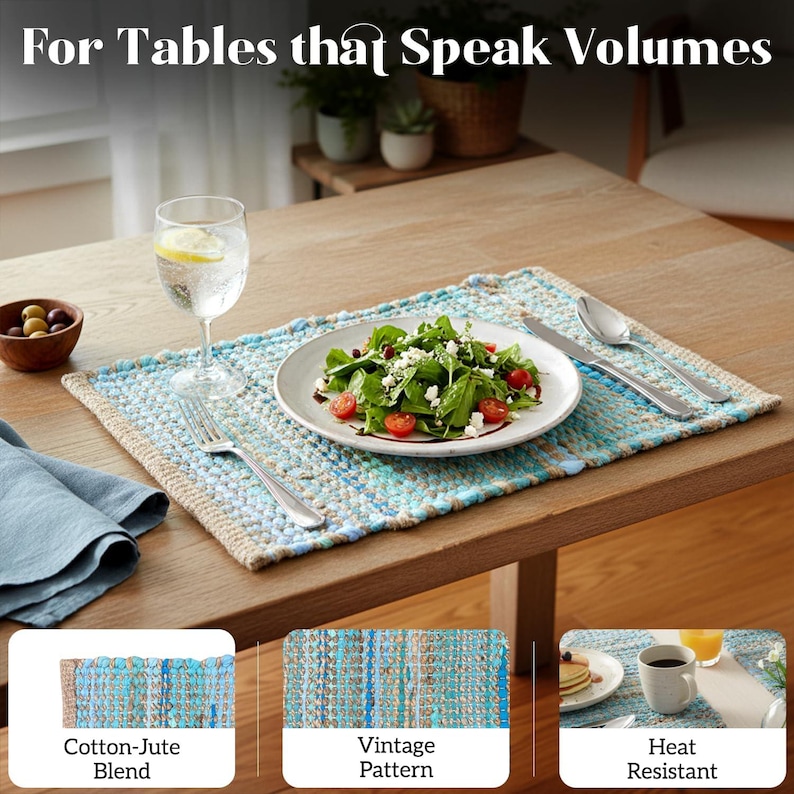 May include: A rectangular placemat made of a cotton-jute blend with a vintage pattern in shades of blue and beige. The placemat is on a wooden table, with a plate of salad, silverware, and a glass of water.