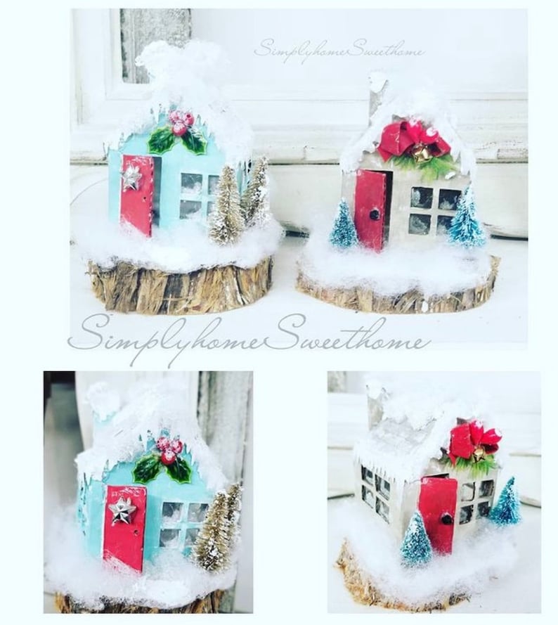 May include: Handmade Christmas village houses with snow-covered roofs, red doors, and miniature trees. The houses are set on wooden bases and decorated with festive accents. The text "Simplyhome Sweet home" is visible.
