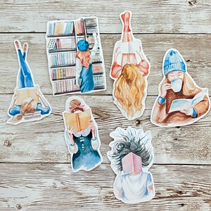 May include: Six watercolor illustrations of people reading books. Each illustration is on a white background and features a person with different hair styles, clothing, and poses. The illustrations are perfect for scrapbooking, card making, or other craft projects.