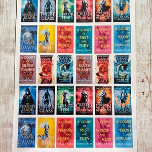 May include: A sheet of stickers featuring book covers from the Throne of Glass and A Court of Thorns and Roses series by Sarah J. Maas. The stickers are colorful and feature various characters and scenes from the books.