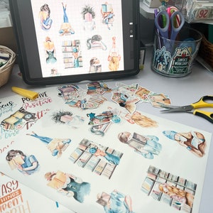 May include: A sheet of stickers featuring illustrations of women reading books. The stickers are on a white background and include various quotes such as "Focus Good", "Positive Vibes", and "Easy Things Aren't Growth".