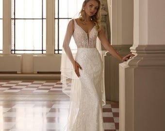 Vestido de noiva sereia com renda e lantejoulas, sob medida.