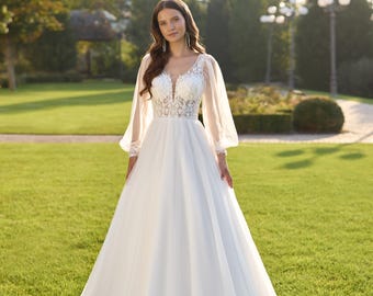 Vestido de novia corte A: corpiño de encaje, mangas largas de tul. Vestido de novia a medida.