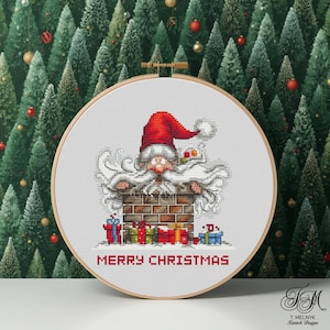May include: A cross-stitch embroidery hoop featuring Santa Claus emerging from a brick chimney, with a red hat and white beard. The words "MERRY CHRISTMAS" are stitched below, with wrapped gifts. The background is a Christmas tree pattern.