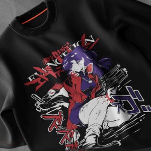 May include: Black sweatshirt featuring a graphic of an anime character with purple hair, wearing a red jacket and holding a gun. The design includes Japanese text and action lines in red and purple.