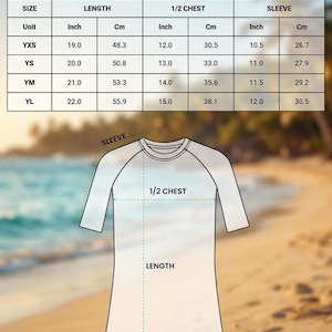 May include: A size chart for an AOP youth short-sleeve rash guard featuring a diagram of a shirt with labelled length, sleeve, and 1/2 chest measurements. The table provides specific dimensions in inches and centimetres for sizes YXS, YS, YM, and YL.