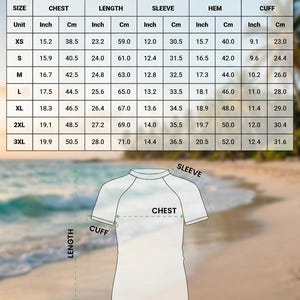 May include: A size chart for a short-sleeve rash guard, featuring a table with measurements in inches and centimetres for sizes XS through 3XL. Below the table is a line drawing of a shirt with arrows indicating chest, length, sleeve, and hem.
