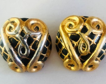 Chanel Boucles d'oreilles à clip avec logo CC en relief rond en métal