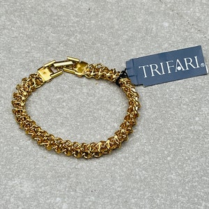 Louis Vuitton LV Twiggy Bracelet Golden Metal. Size One Size