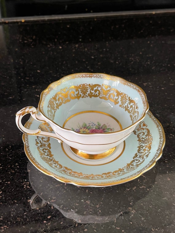 Paragon Vintage Bone China Tea Cup and Saucer: HM Queen Flowers 