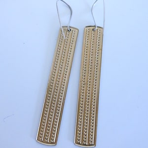 Long textured gold column drop earrings