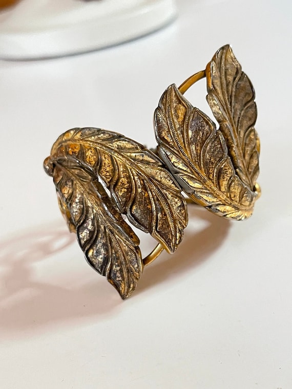 Tortolani hinged vintage brass leaf clamper bracel