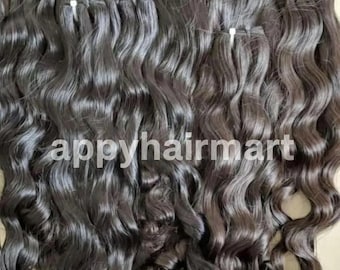 Fasci di capelli umani grezzi; capelli naturali indiani dalla consistenza morbida, setosa e liscia.