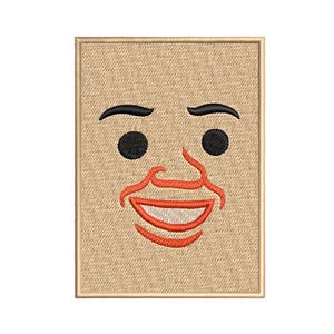 May include: Embroidered patch featuring a stylized face with black eyes and eyebrows, a red nose, and a smiling red mouth. The face is centered on a tan rectangular patch with a textured appearance, framed by a thin, darker border. The design is simple and cartoonish.