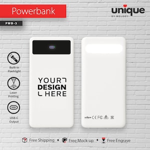 May include: White power bank with the text "YOUR DESIGN HERE". Features include a built-in flashlight and USB-C output. The power bank has a digital display showing 100%. The word "Powerbank" is in red.