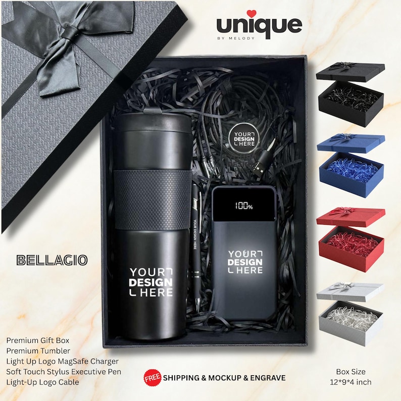 May include: A black gift box containing a black tumbler with a textured grip, a black power bank with a digital display showing 100%, a black stylus pen, and a charging cable. The box lid features a black ribbon bow and the text BELLAGIO.