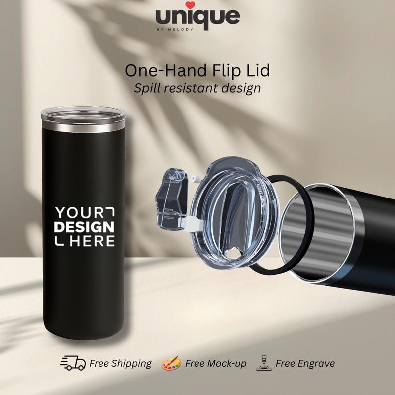May include: A matte black cylindrical tumbler with a silver rim and the text YOUR DESIGN HERE. The tumbler features a detachable clear plastic one-hand flip lid with a black rubber sealing ring, showcasing a spill-resistant design component.