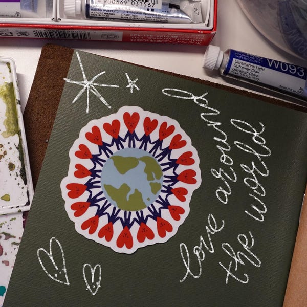 The heart and the world - Vinyl Sticker