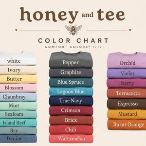 May include: A colour chart for Comfort Colors 1717 t-shirts by honey and tee, featuring three stacks of folded shirts in various colours. The text includes the brand name, colour chart, and labels for each shirt colour, such as white, pepper, and orchid.