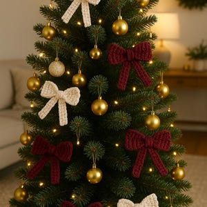 May include: A decorated Christmas tree with gold ornaments and string lights. The tree is adorned with cream-colored and burgundy crochet bows. The background includes a sofa, a wreath, and a lamp.