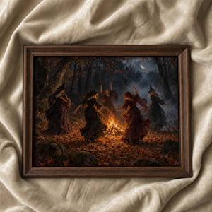 May include: A rectangular dark wood frame containing a painting of five figures in dark dresses and pointed hats dancing in a circle around a bright orange campfire in a forest filled with fallen autumn leaves under a crescent moon.