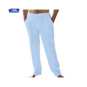 Könnte beinhalten: Hellblaue Leinenhose mit Kordelzug am Bund. Die Hose hat Taschen und eine lockere Passform. Das Bild enthält auch den Text "FREE SHIPPING".