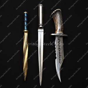 May include: Three distinct metal blades arranged vertically. The left is a gold-toned spiral-fluted tool with a dark blue cylindrical handle. The center is a sleek, straight silver-toned dagger. The right is a curved blade with an antler handle.