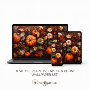 May include: A laptop, tablet, and smartphone displaying a digital wallpaper set featuring orange pumpkins, pinecones, red berries, and autumn leaves. The text below reads: DESKTOP, SMART TV, LAPTOP & PHONE WALLPAPER SET and HONEYBRUSHED ART.